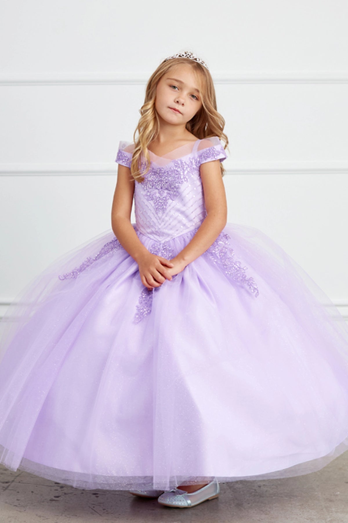 The Lilac kids pageant dress has chevron-patterned lace.