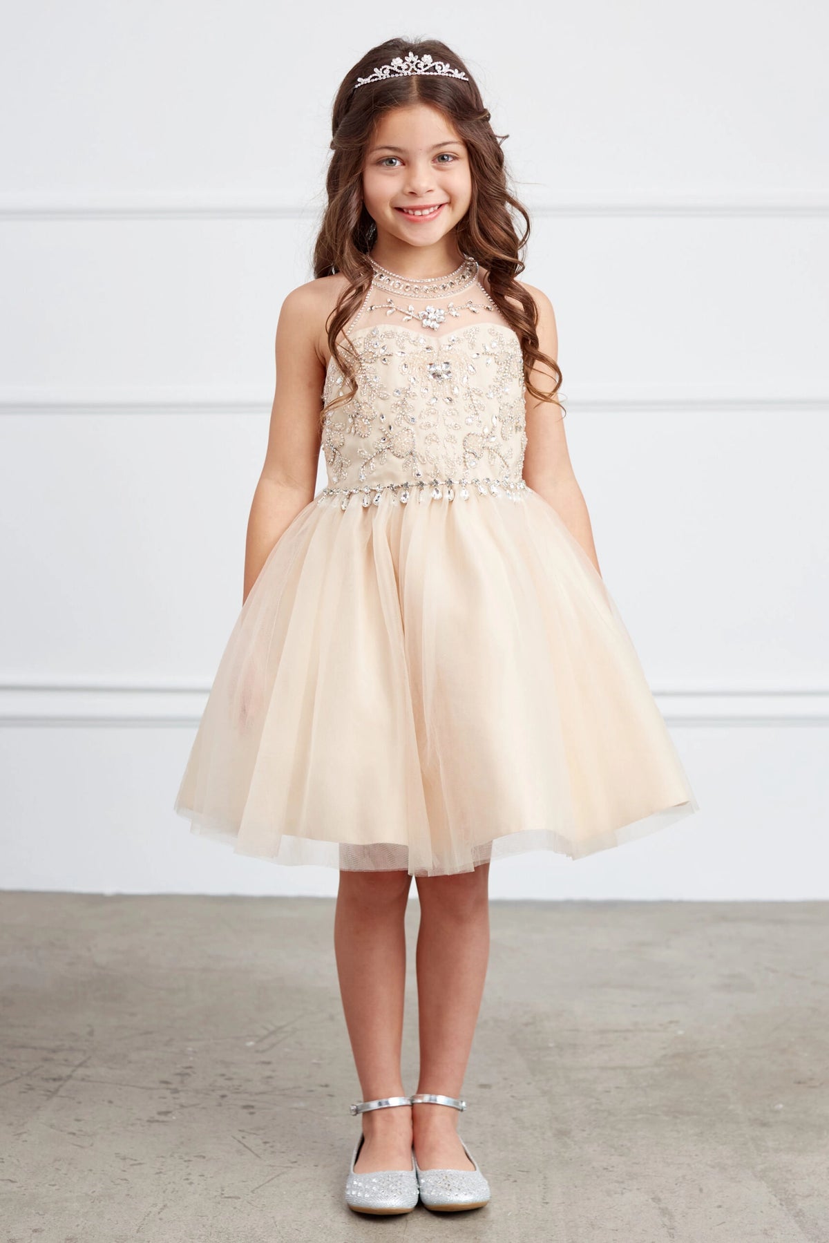 Gold kids pageant dress featuring a rhinestone-trimmed choker neckline.