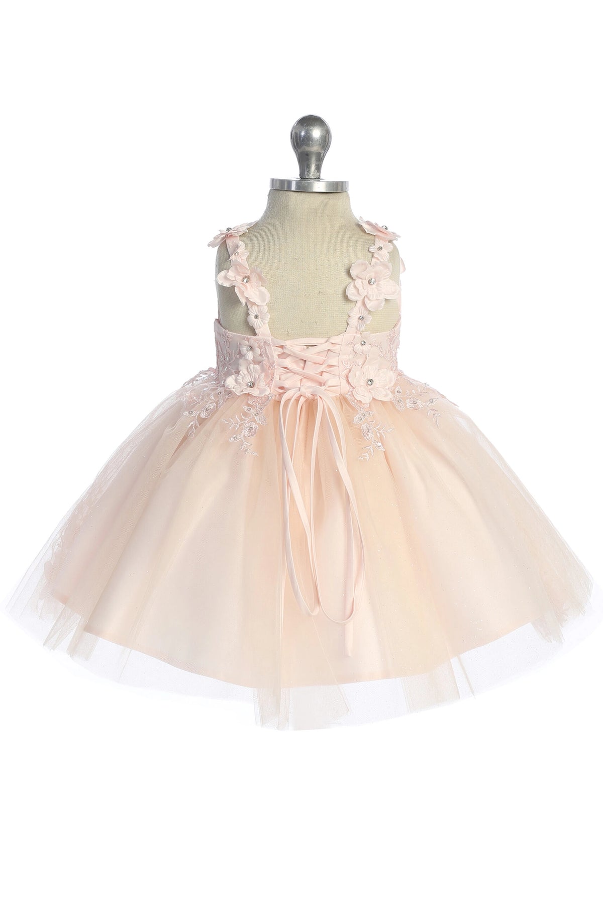 The Blush kids pageant dress has floral appliques on a full tulle skirt.