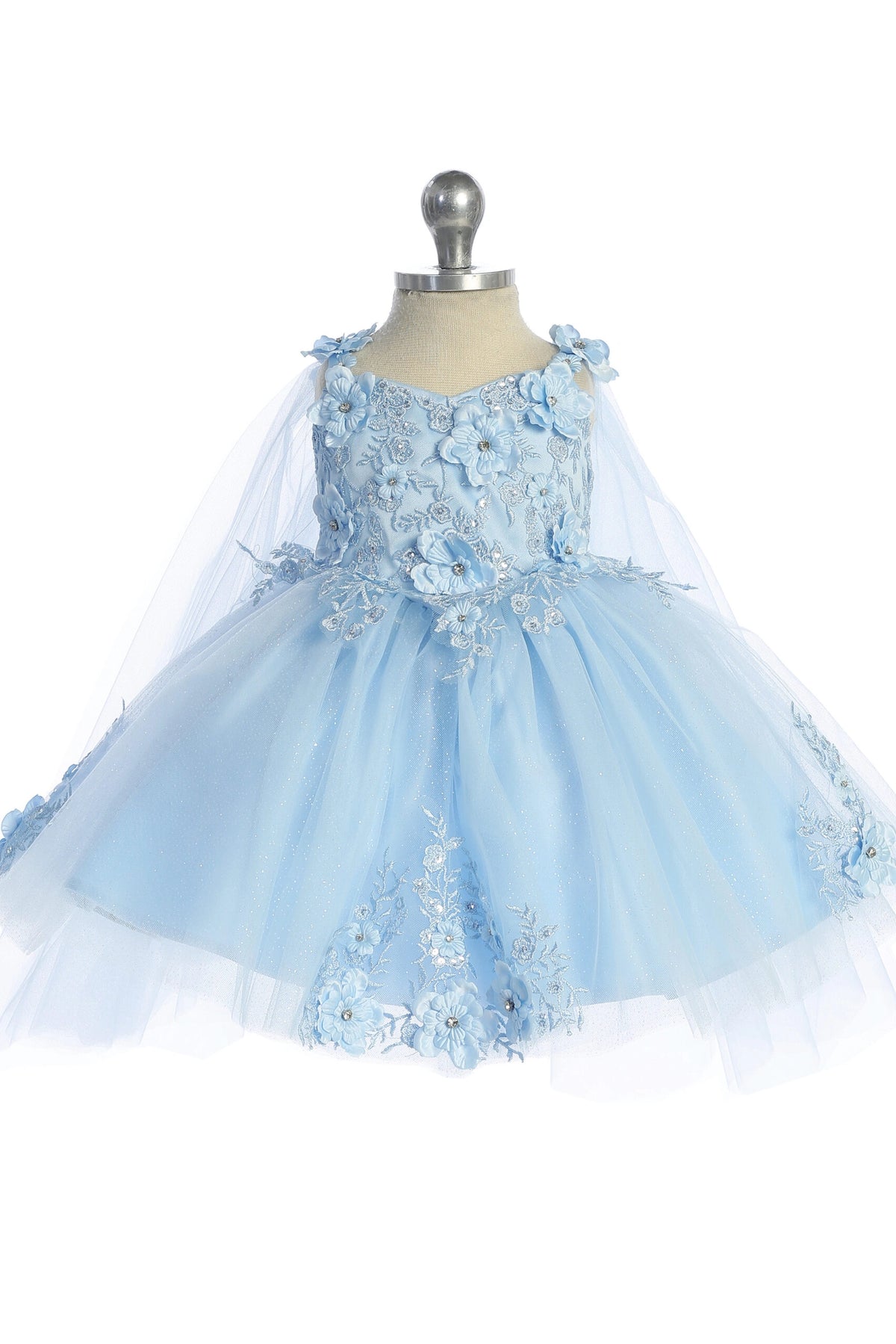 Seen from the front, this Sky Blue kids pageant dress displays floral appliques on a full tulle skirt.