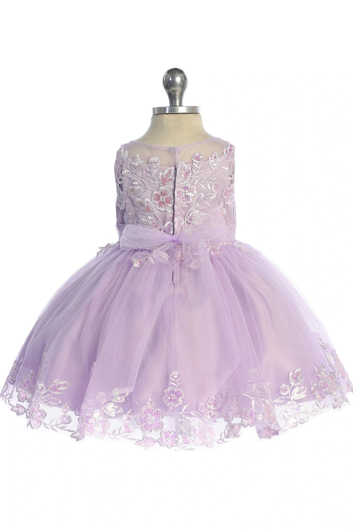 On the Lilac kids pageant dress, the detailing includes lace-up ties at the back.