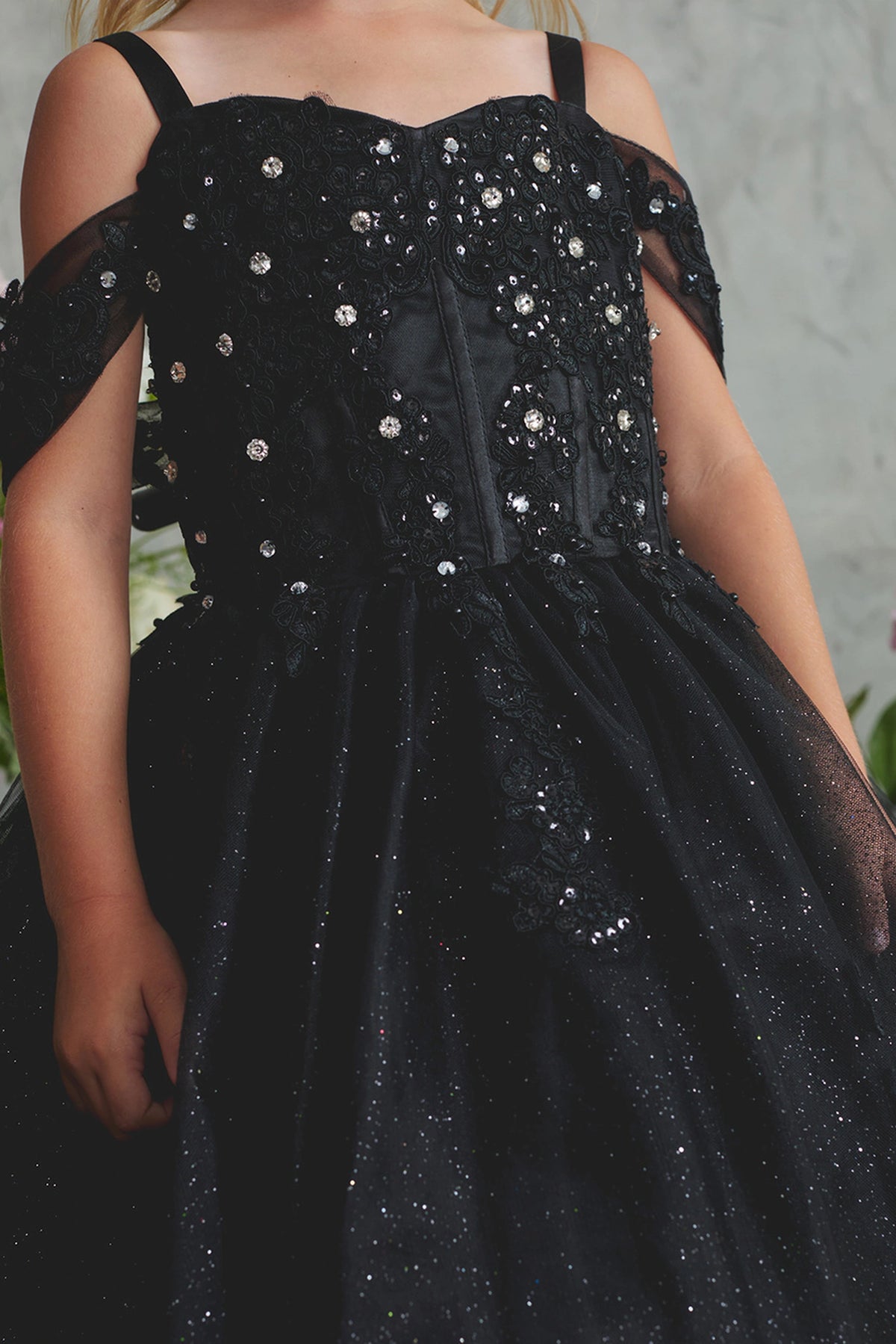 Visible details on the Black kids pageant dress include beads across the upper bodice.