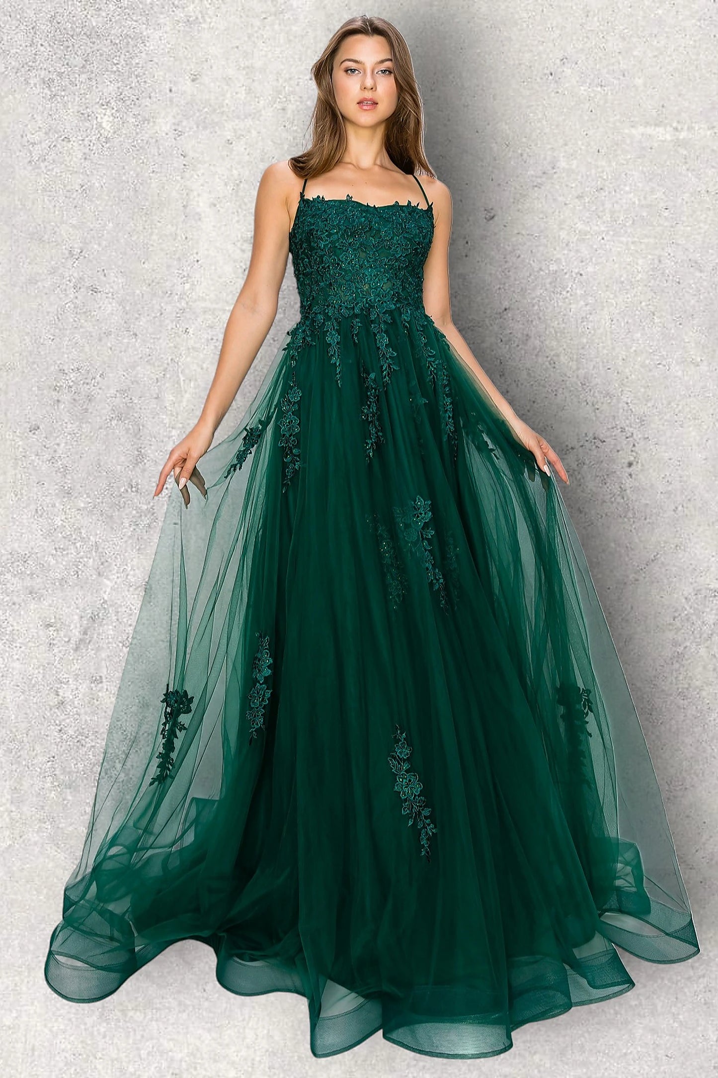 Hunter Green evening dress completed with cascading floral appliques on skirt