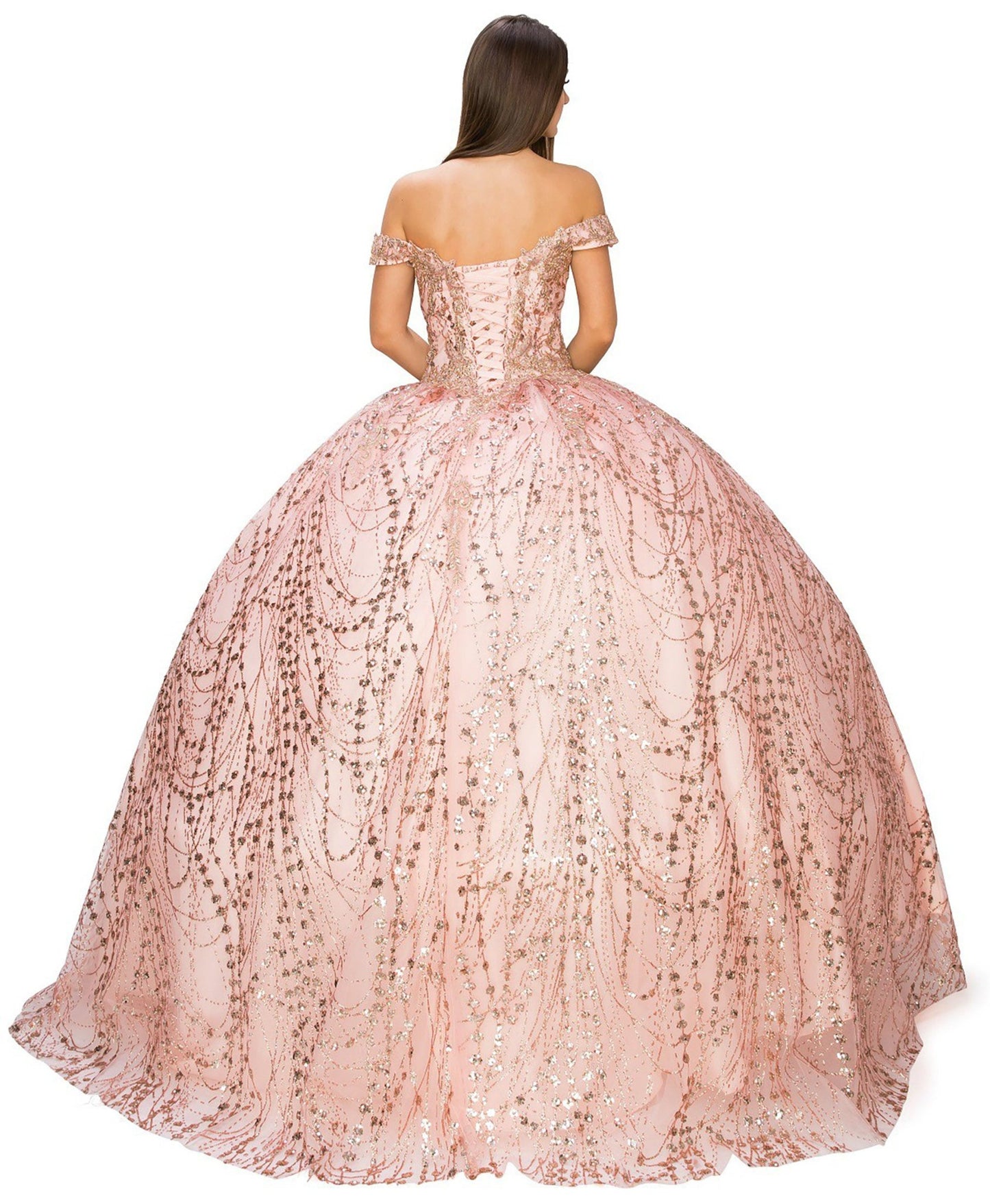 Back view of a woman wearing rose gold quinceanera ball gown with lace-up corset, gold embroidery, and glitter bodice