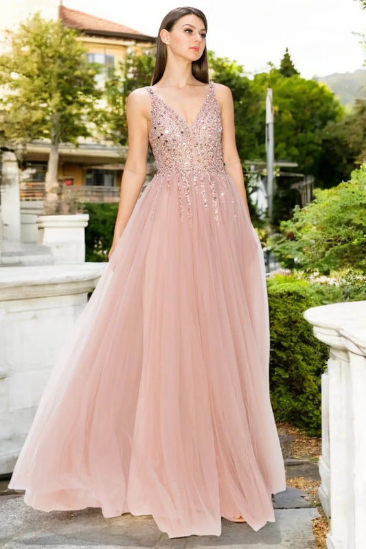 Full length- view of dusty rose formal dress featuring open V-length- design.