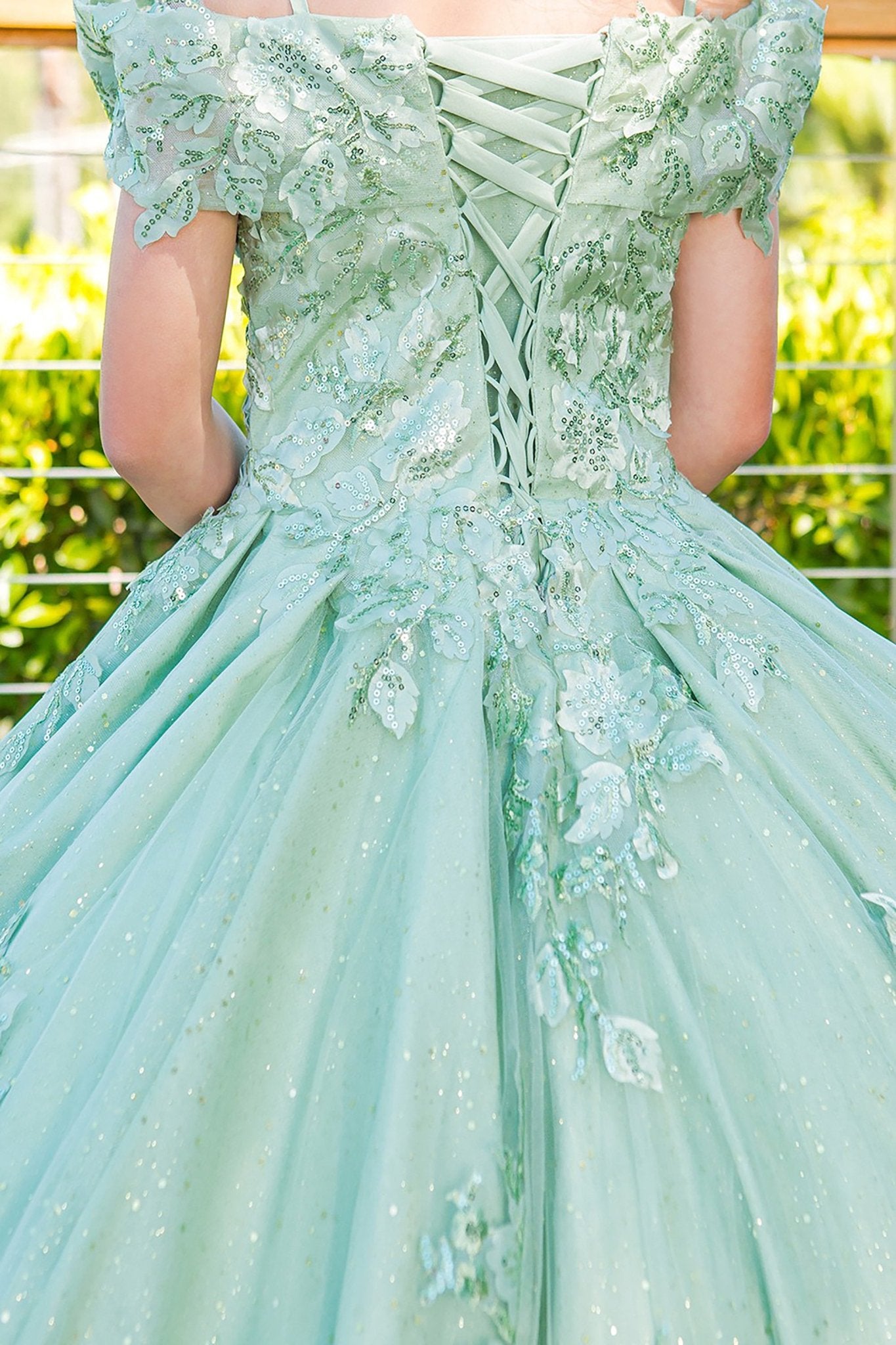 Sage back zoom kids mini quinceañera mini quince dress with sweetheart neckline, 3D floral sequin applique and glitter lace train.