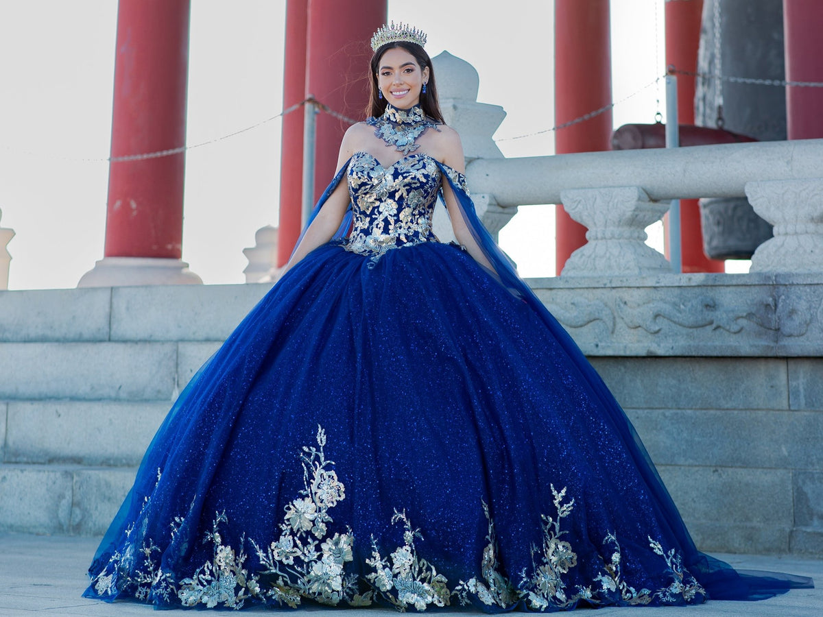 Front view presents navy quinceanera ball gown with golden lace, detachable shoulder train sleeves, and rhinestone detailing.