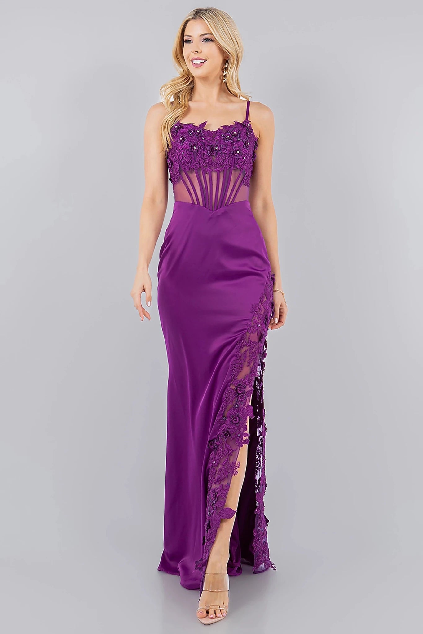 Grape spaghetti strap gown completed with floor-length silhouette and sweeping train