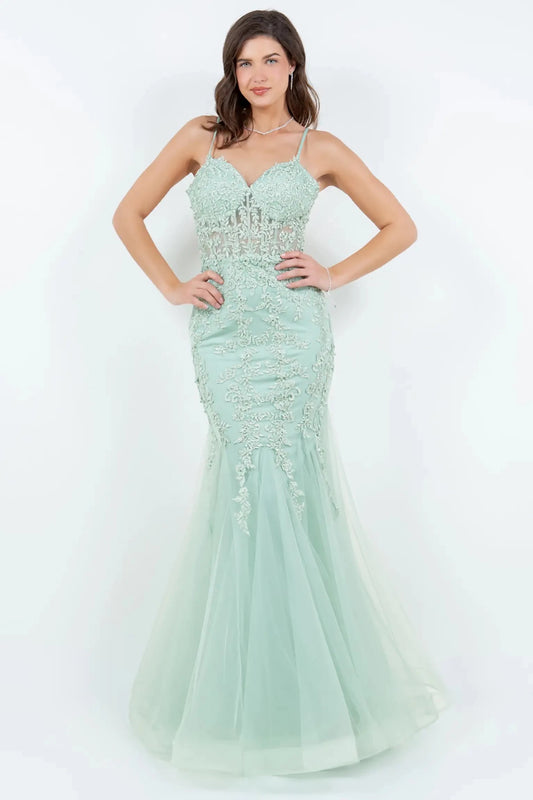 A full-length view of a woman wearing sage mermaid dress with lace-up corset closure.