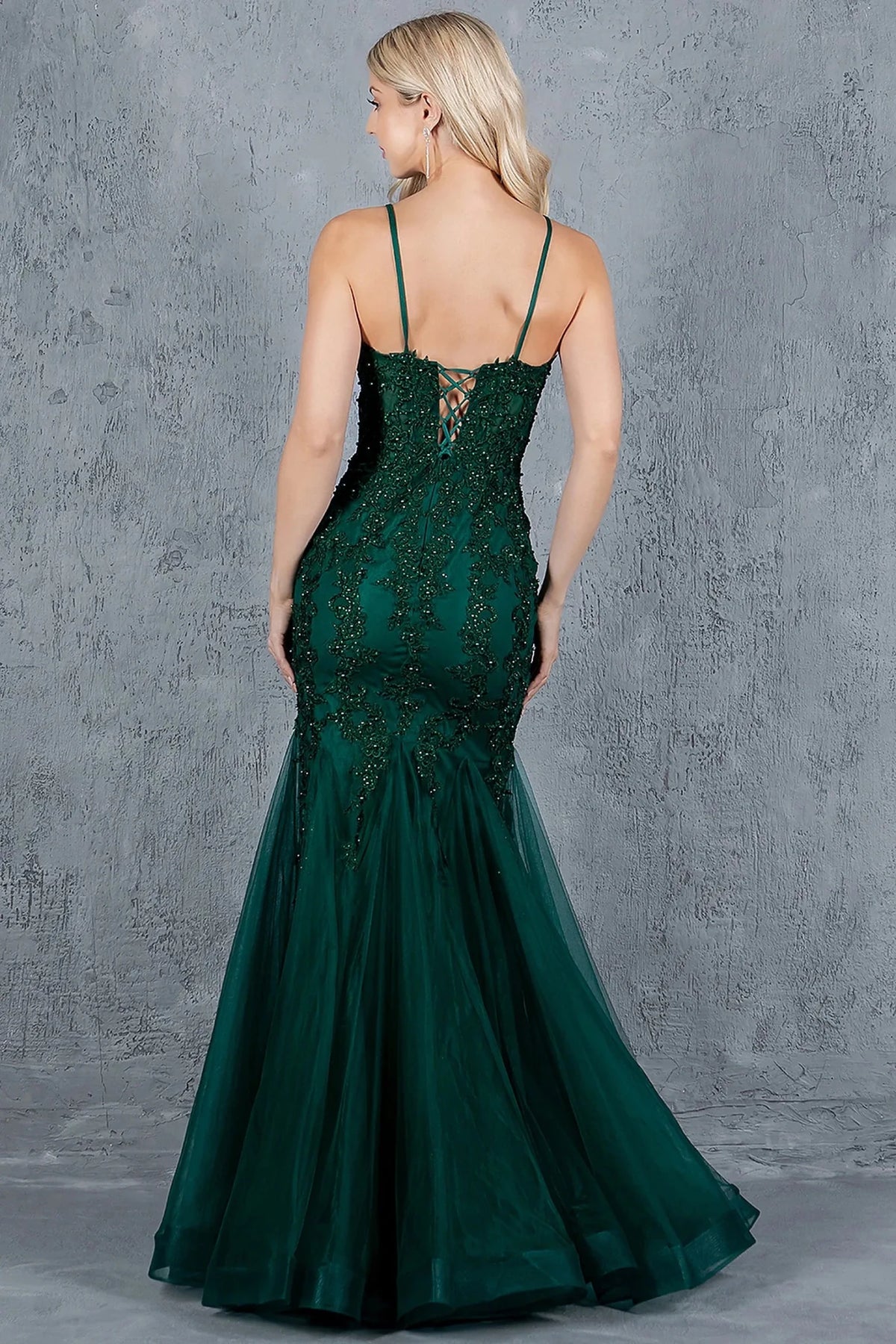 Rear view reveals hunter Green mermaid gown completed with crisscross lace-up back and zipper closure.