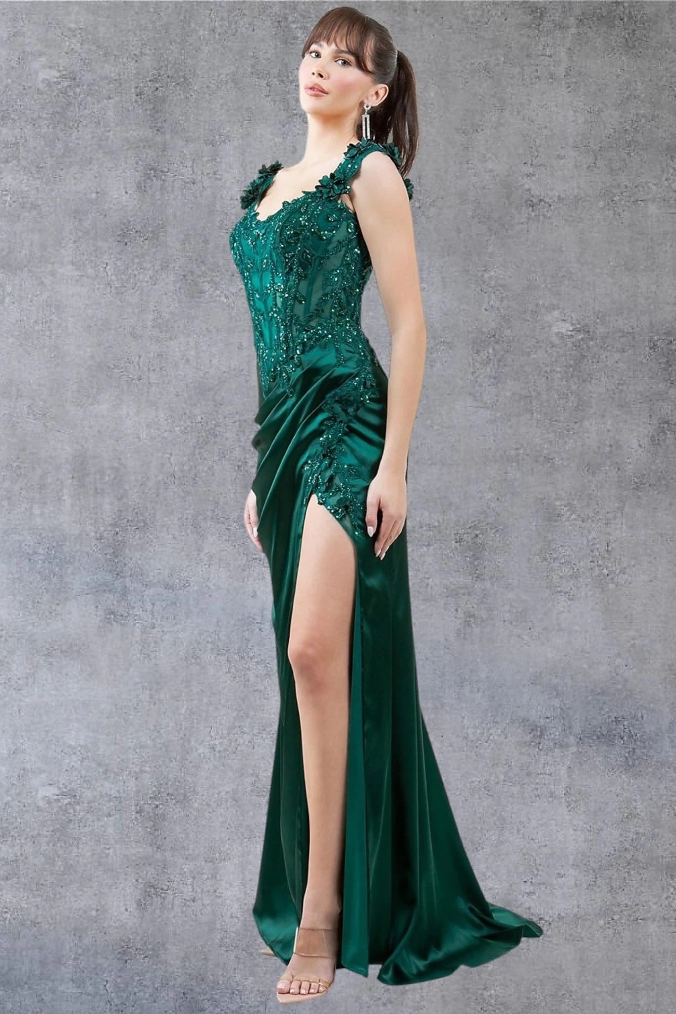 Hunter green evening dress completed with thigh-high slit and dramatic train