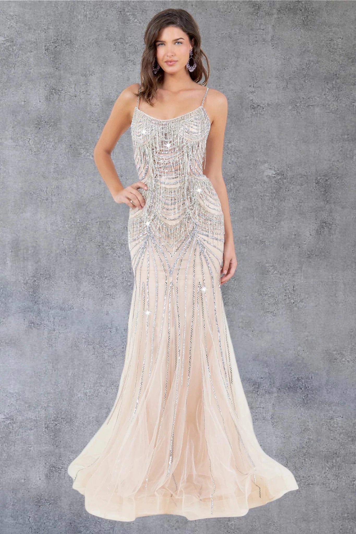 Nude evening gown completed with structured hem using horsehair finish