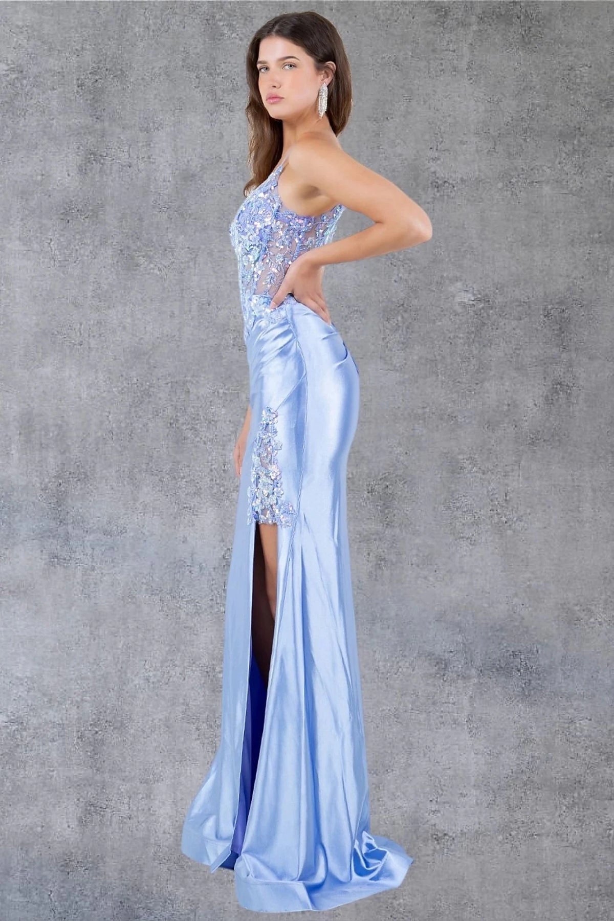 Textured details appear across lavender prom dress styled with lace embroidery defining waistline.