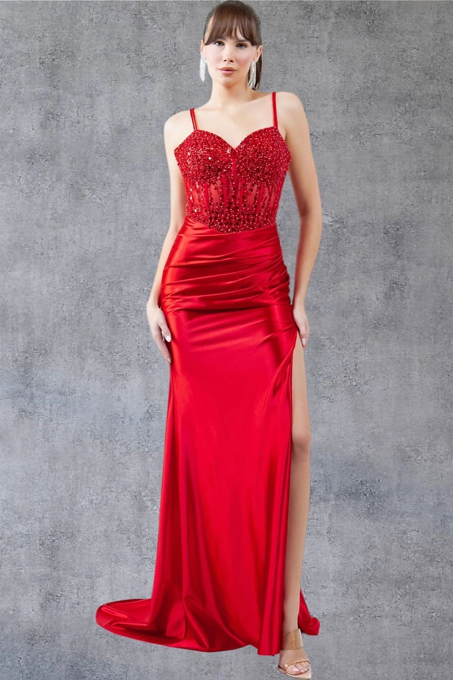 Red prom dress completed with thigh-high slit for movement