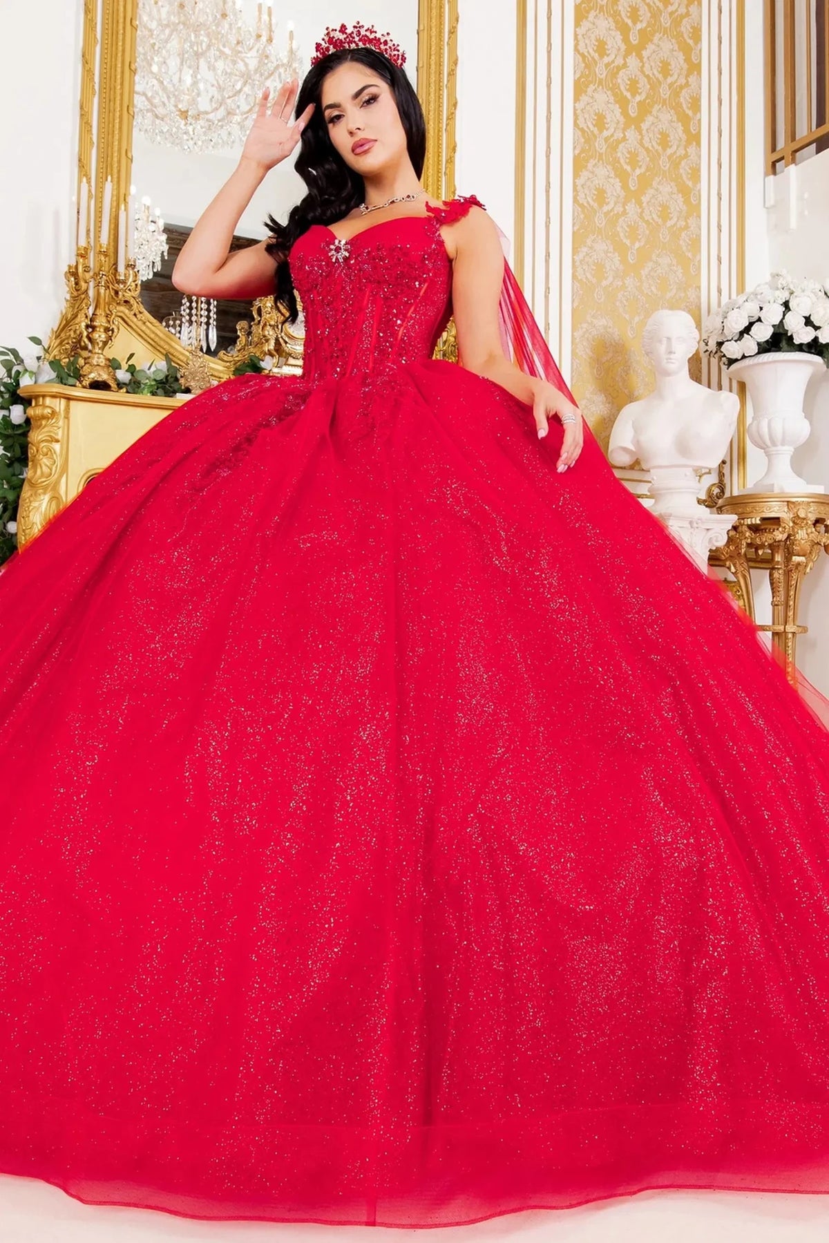 ed ball gown with a sweetheart neckline, beaded bodice, and sheer draped shoulder straps