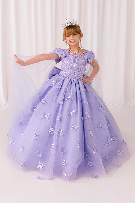 Young girl in a lilac mini quince dress with butterfly details against a white curtain background