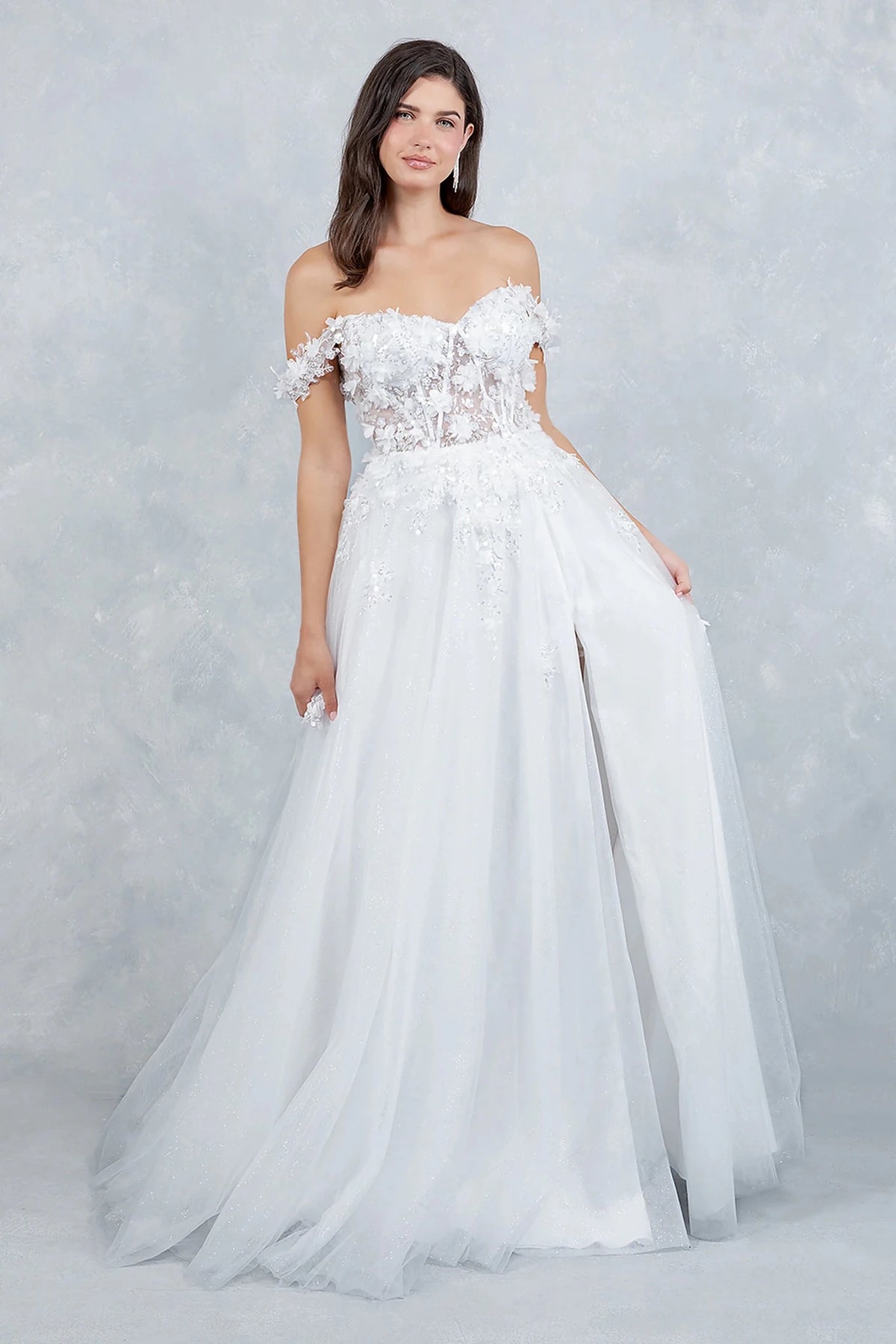 White prom dress with off-shoulder neckline adorned in 3D floral appliqués and sequins