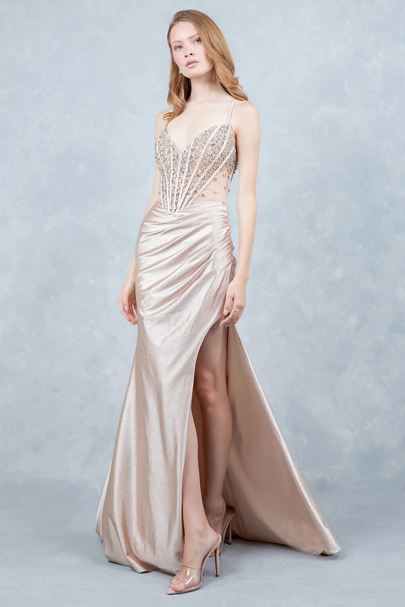 Champagne evening gown crafted from shimmering glitter knit with fitted silhouette