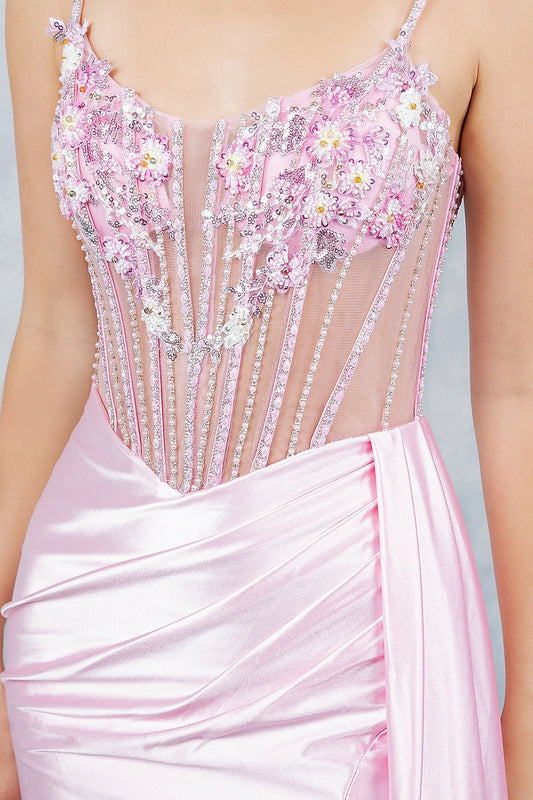 Pink evening gown featuring 3D floral appliqués, beads and crystal lines