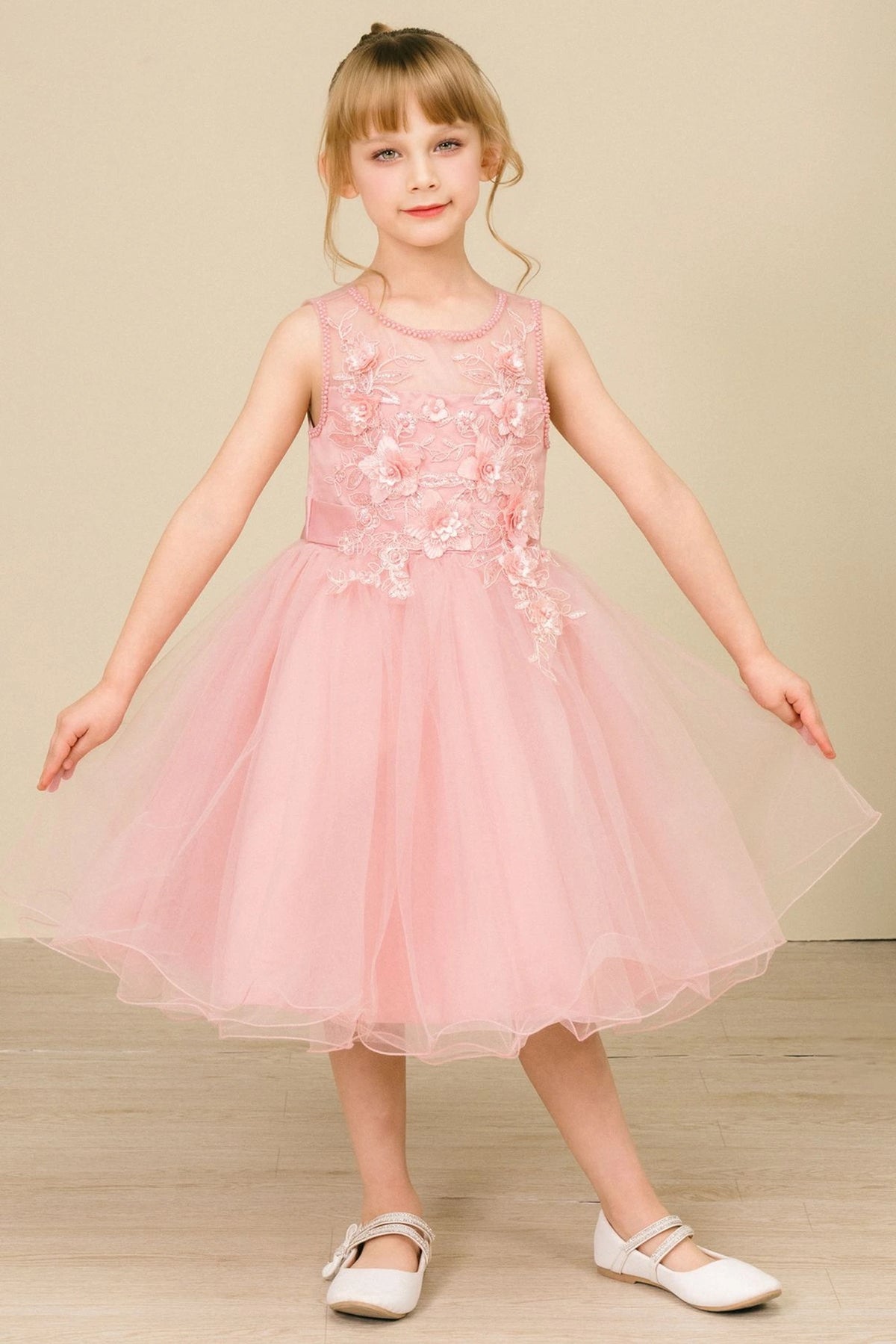 Dusty Rose flower girl dress features floral bodice with a layered tulle skirt.