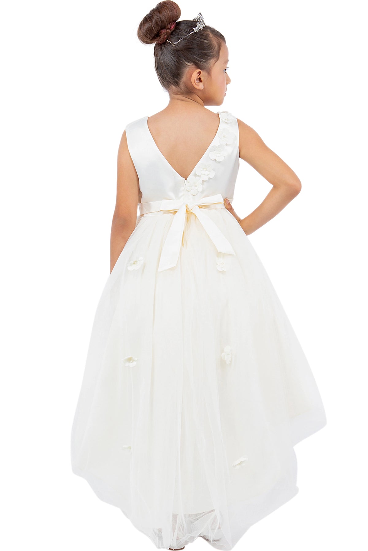 A Ivory flower girl dress showing V-shaped back with satin sash bow.