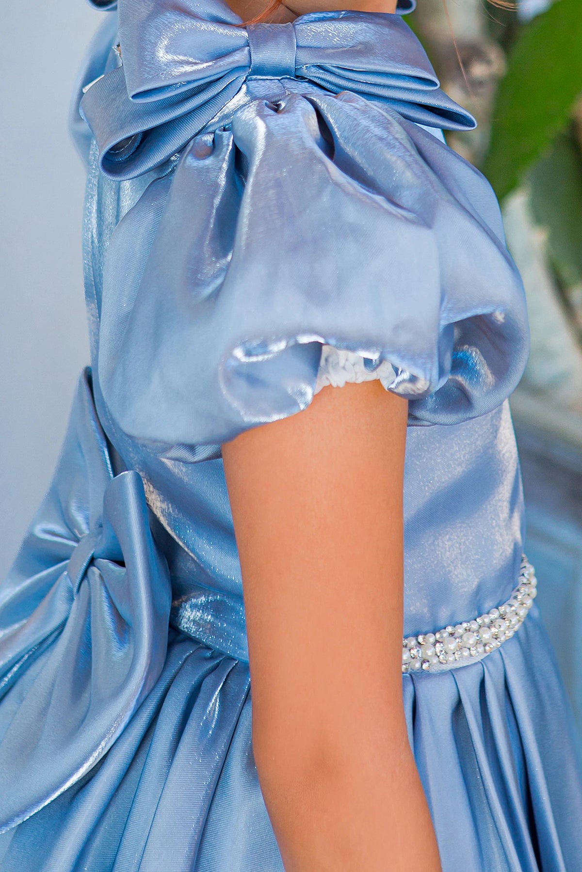 Notice the puff sleeve and tied shoulder bow on this Blue flower girl dress.