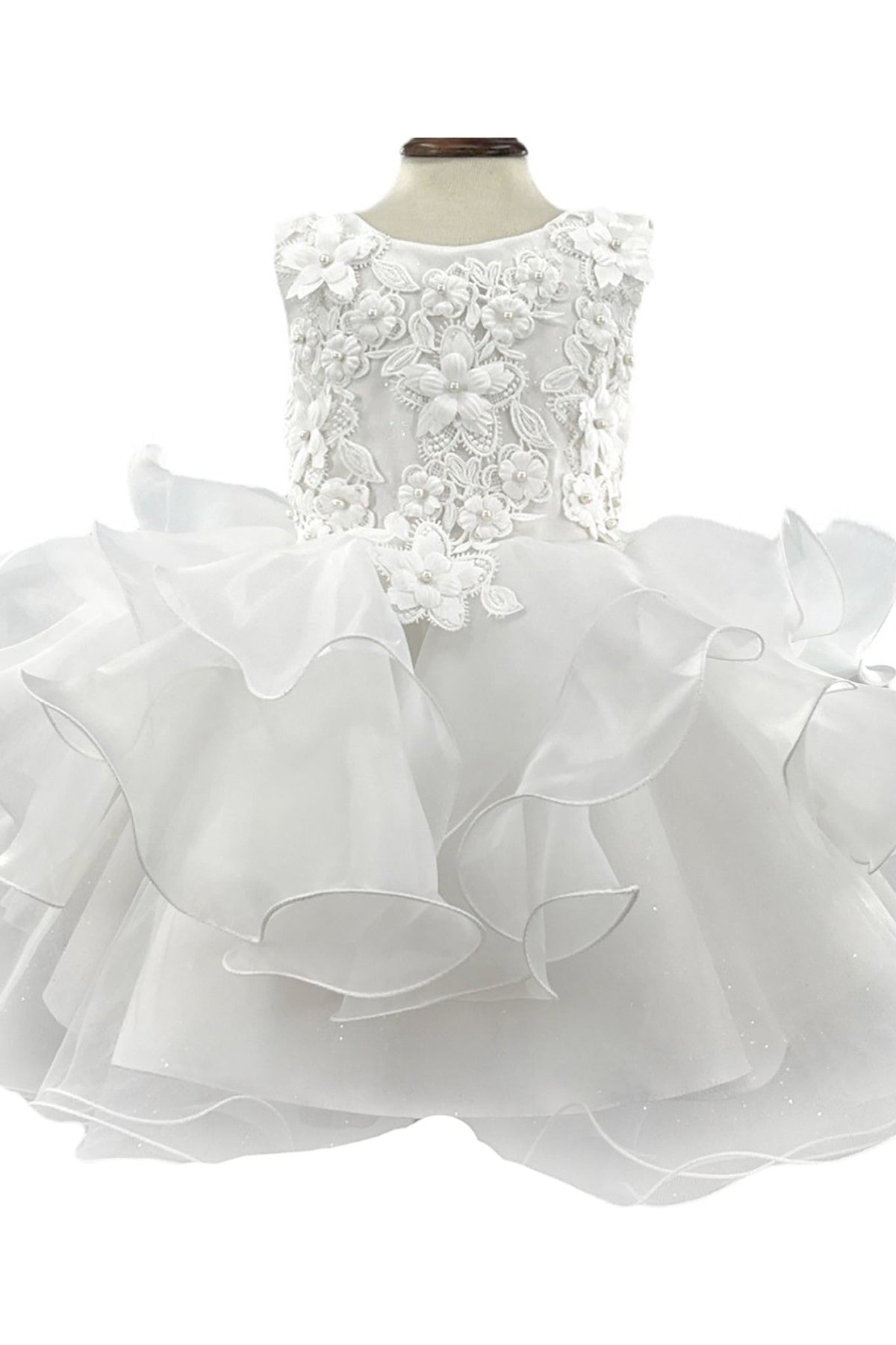 Detailed view highlights Off-White Baby flower girl dress with lace top and ruffled skirt.