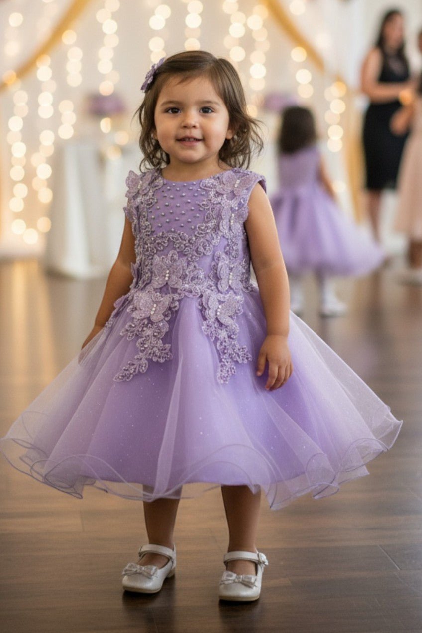 Lilac flower girl Dress Front View With Layered Skirt And Oversized Bow Detail.