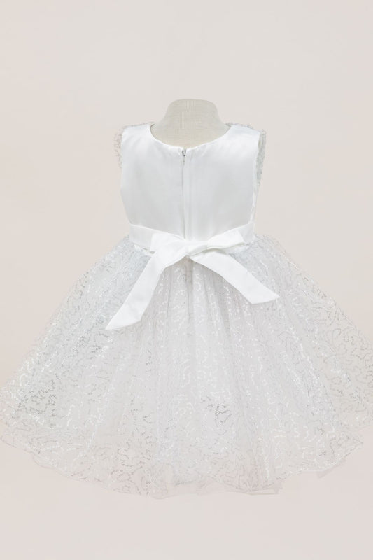 White dress back view highlighting full skirt and elegant silhouette
