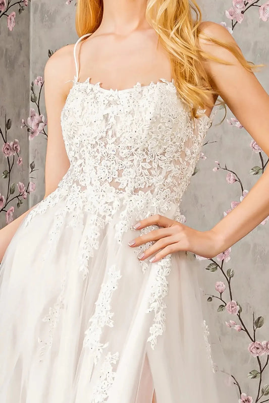 Front close-up upper view highlighting the intricate floral embroidery and shimmering beadwork that decorate the sheer bodice, creating a translucent and textured effect.