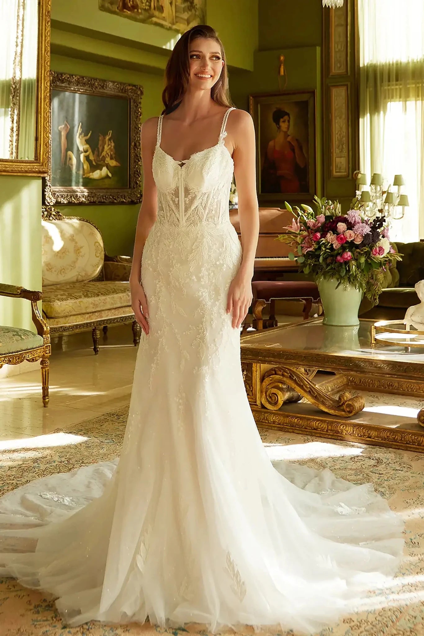 Front full-length view displaying the contoured fit of the embroidered gown and the layered texture of the sequined lace visible beneath the flared hem.