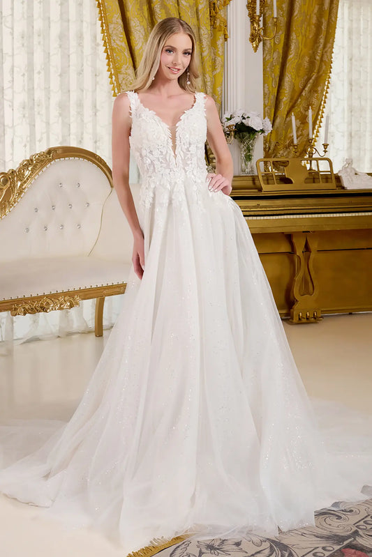 Woman wearing a wedding dress with a fitted V-neck bodice and beaded straps accented with embroidery and glitter.
