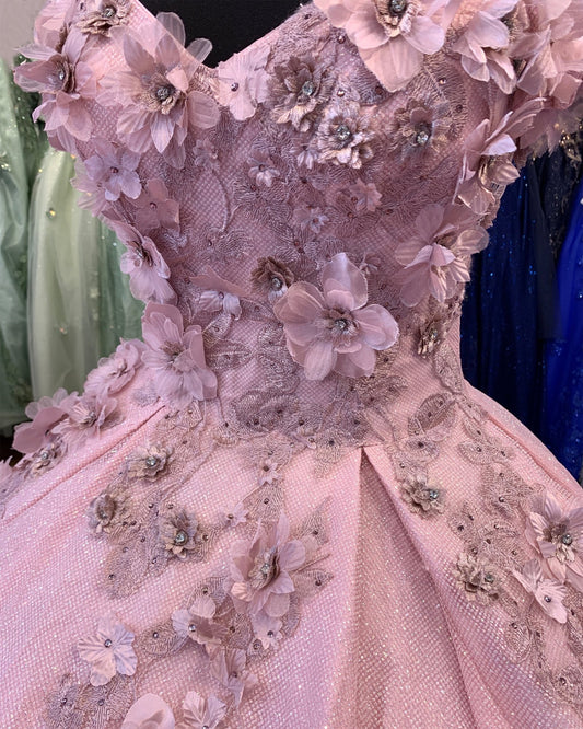 Dusty Rose Quinceanera | 6 Colors | 3D floral off-shoulder ball gown with glitter skirt, bottom pleated, corset back tie - zoomed in front view of dress showcasing flower pattern