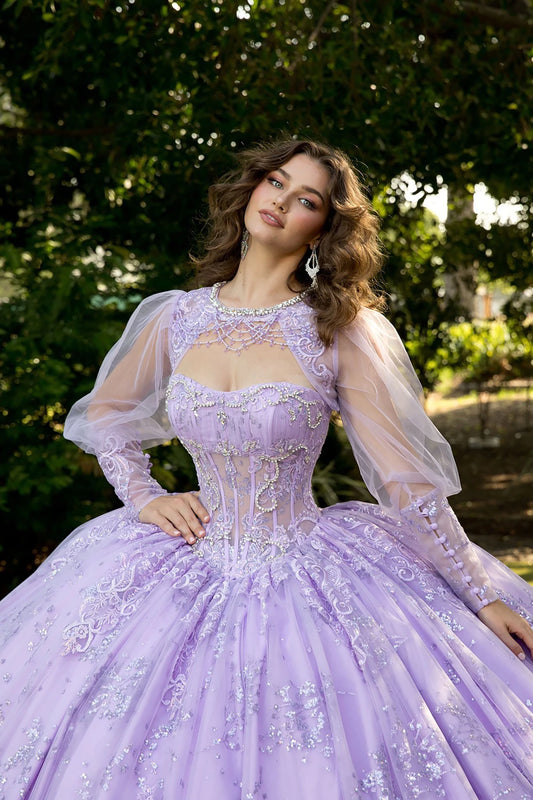 Woman wearing a purple gown with floral embellishments outdoors.