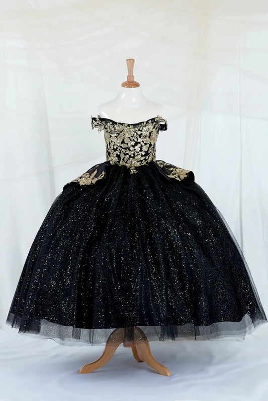 Black sparkly mini quince dress with 3d gold embroidery top on a mannequin against a white background