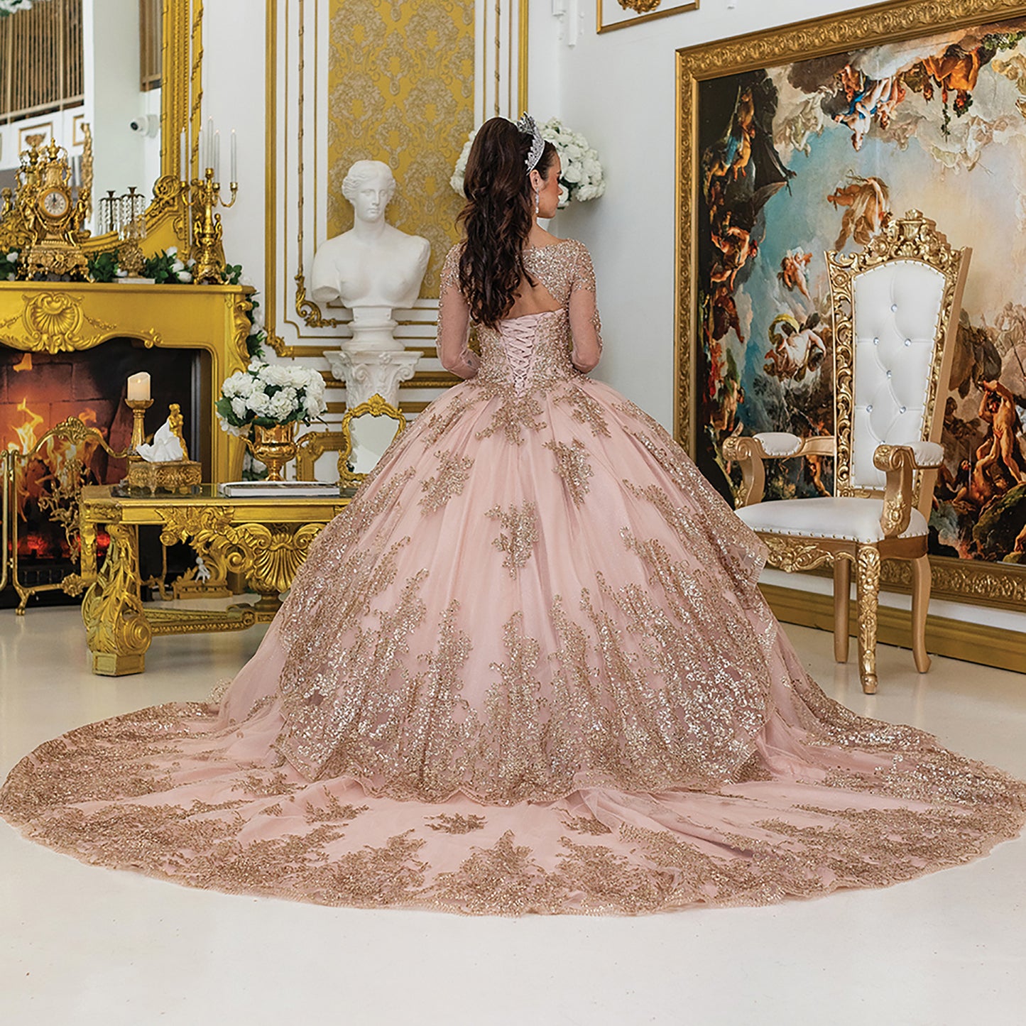 Quinceañera | Rose Gold Rhinestone Sheer Long Sleeve Quinceañera Dress with Long Tail | Rivera dress back view