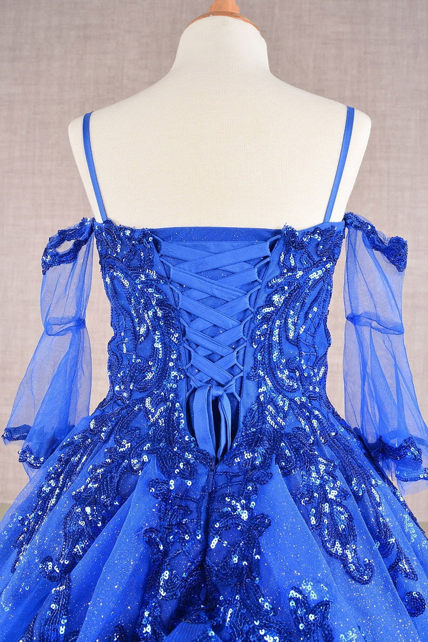 Close-up of blue Royal Blue Kids Dress with Glitter Sequin Mesh and Detachable Sleeves, Mini Quince Dress.