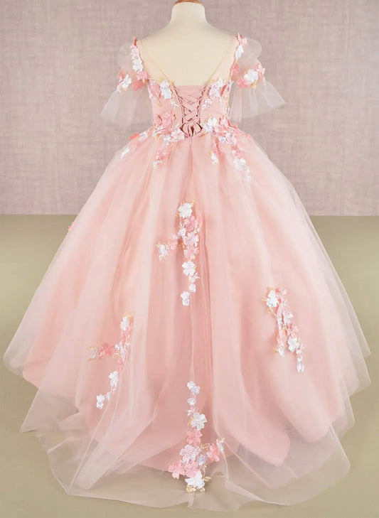 Back blush kid ballgown with 3D floral applique, puff sleeves, and long back hem