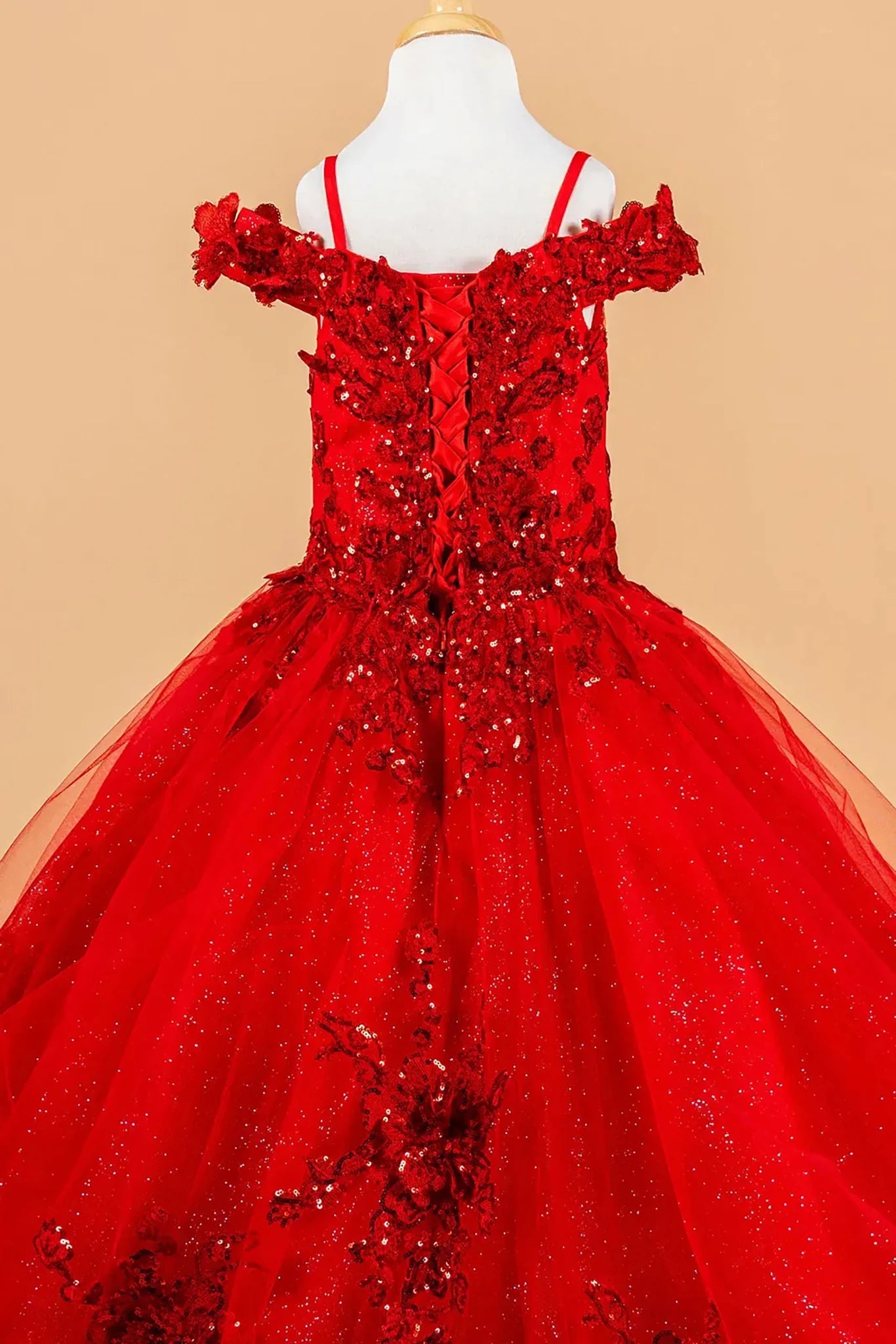 Red kids floral mini quince dress displayed.