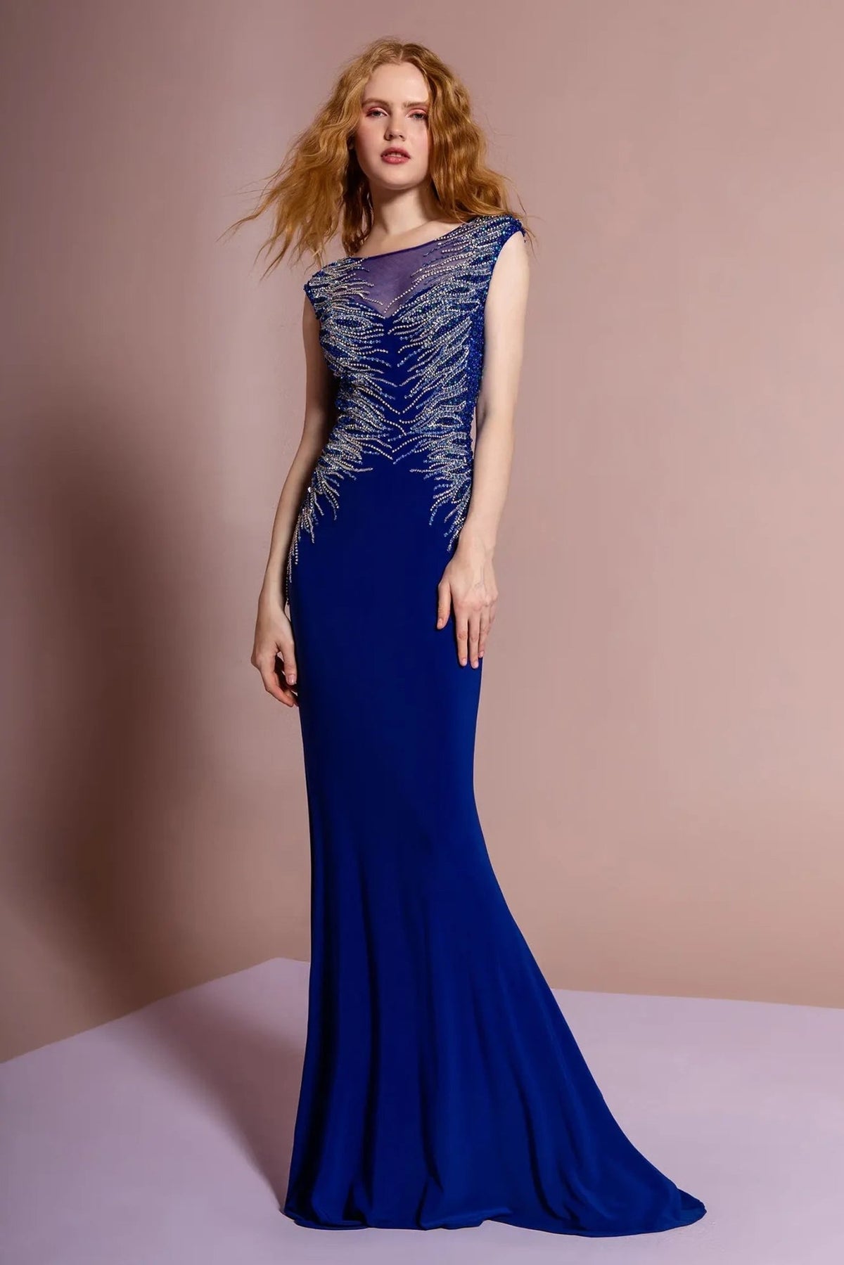 Detailed view highlights royal Blue beading formal dress detail.