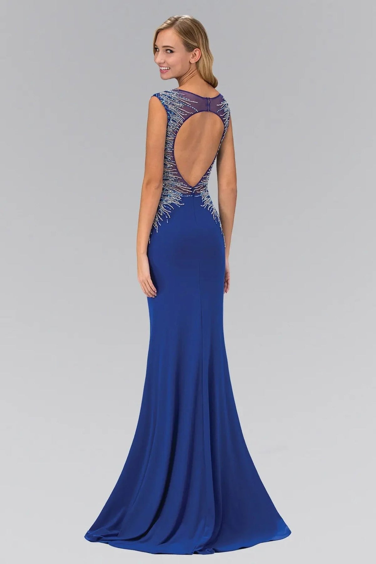 Full-length view highlights royal Blue beading formal dress.
