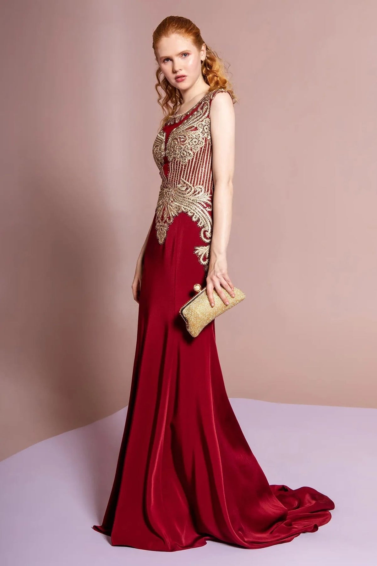 Side profile shows burgundy embellished embroidery formal dress side detail.