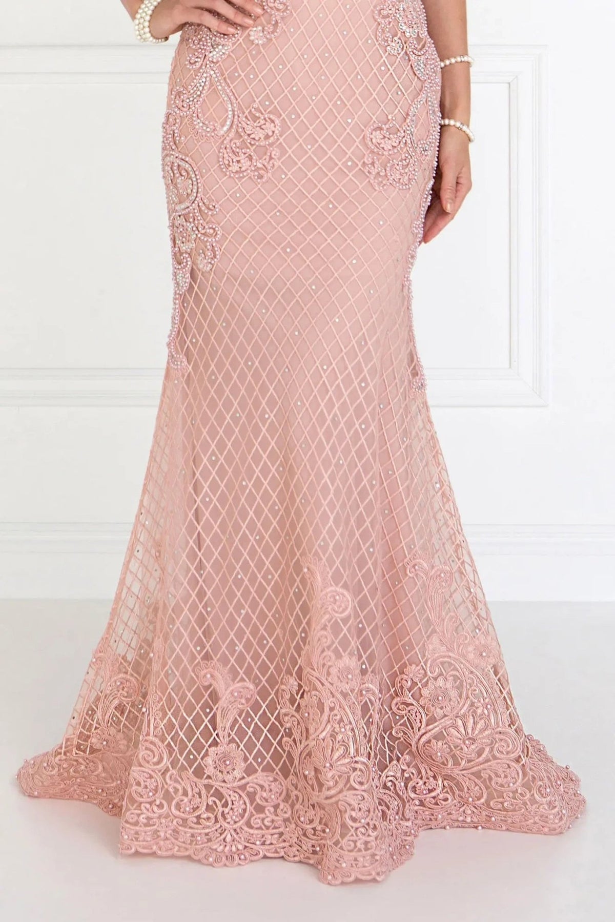 Side profile shows dusty Rose beading embellished embroidery formal dress side detail.