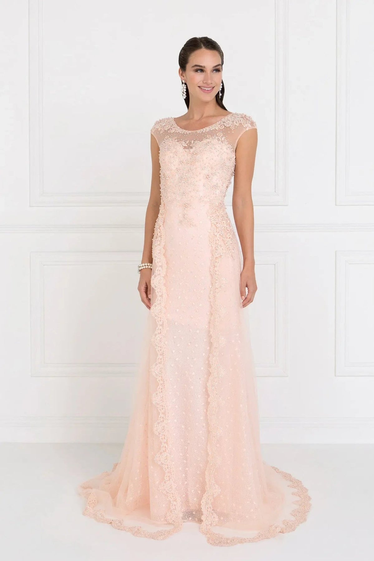 Back detail shows blush beading embellished embroidery formal dress back bodice detail.