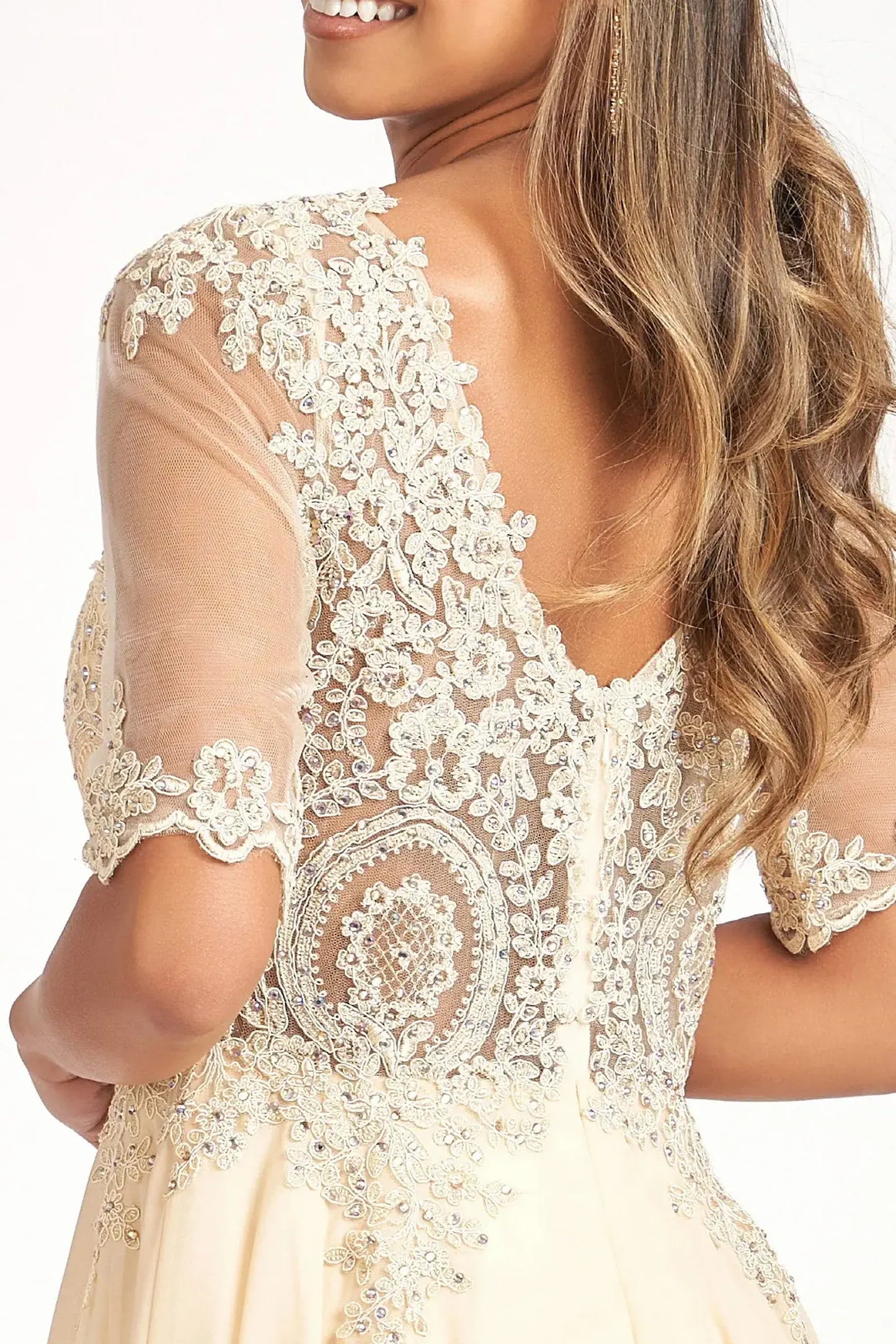 Champagne mother of the bride dress featuring v-back with concealed zipper bodice finished with rhinestones, embroidery, jewels, appliqués
