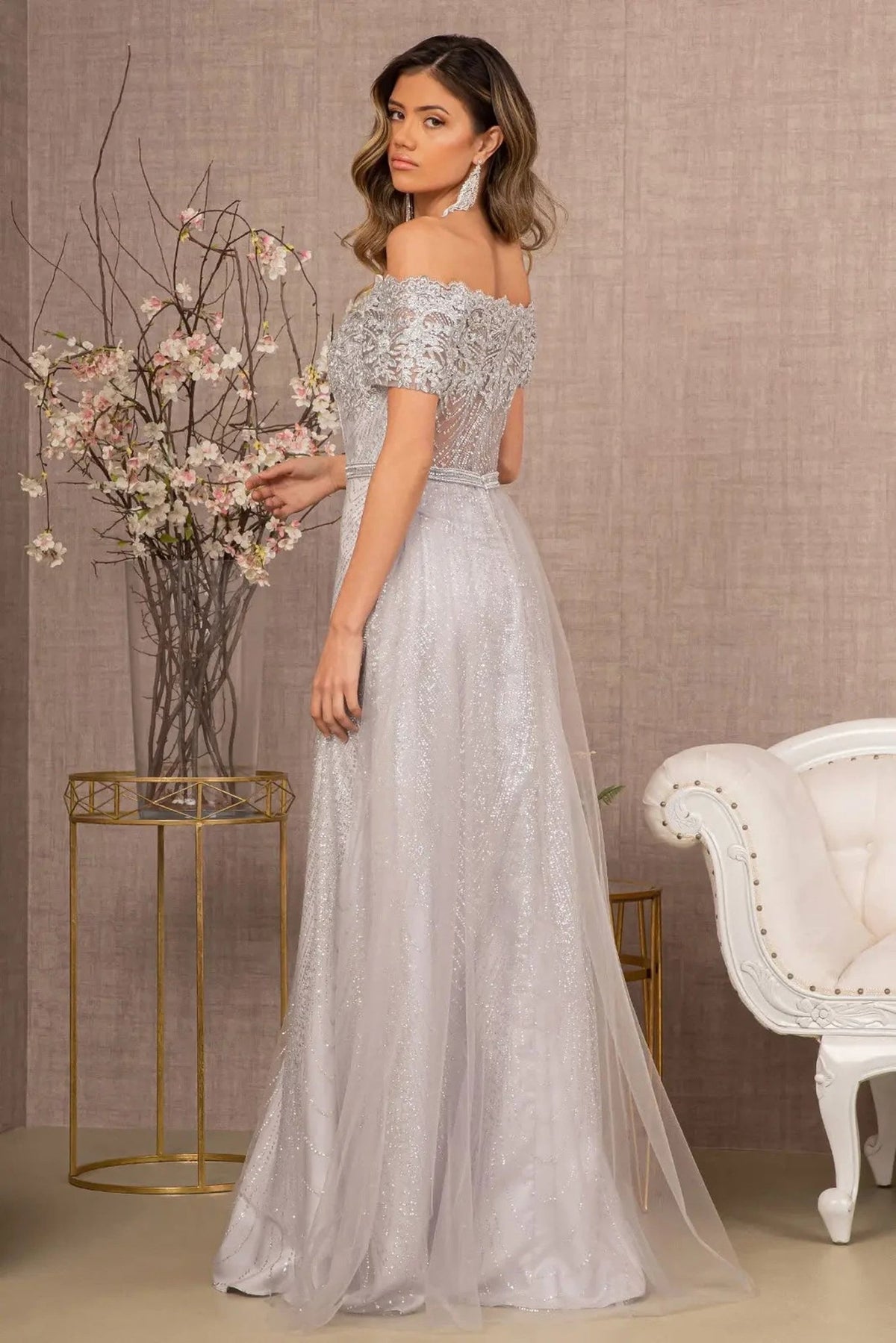 Side profile shows silver beading embellished embroidery formal dress side detail.