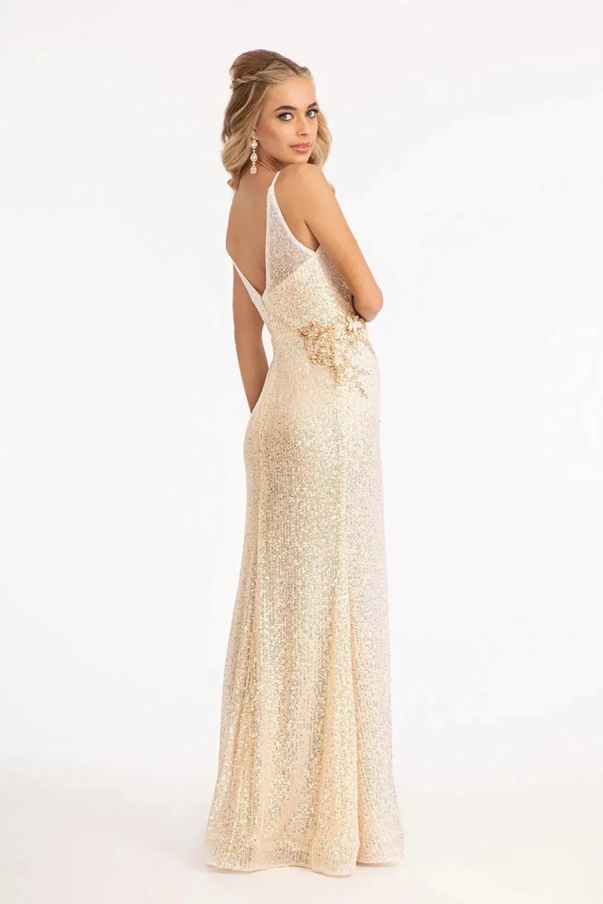 Rear view reveals champagne mermaid mother of the bride dress with v-back with concealed zipper and spaghetti strap.