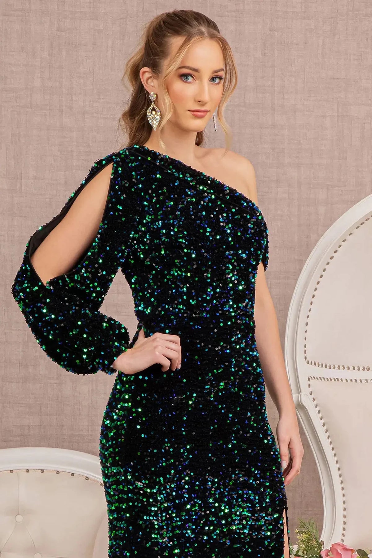 Bodice close-up highlights green mother of the bride dress featuring asymmetric bodice with one shoulder and sequin.
