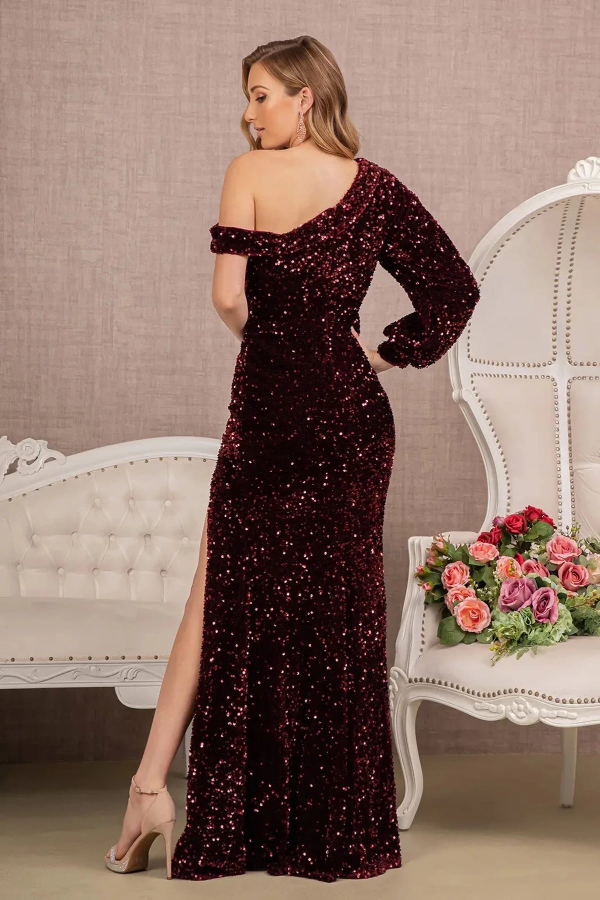 Rear view reveals wine mermaid mother of the bride dress with open back and one shoulder.