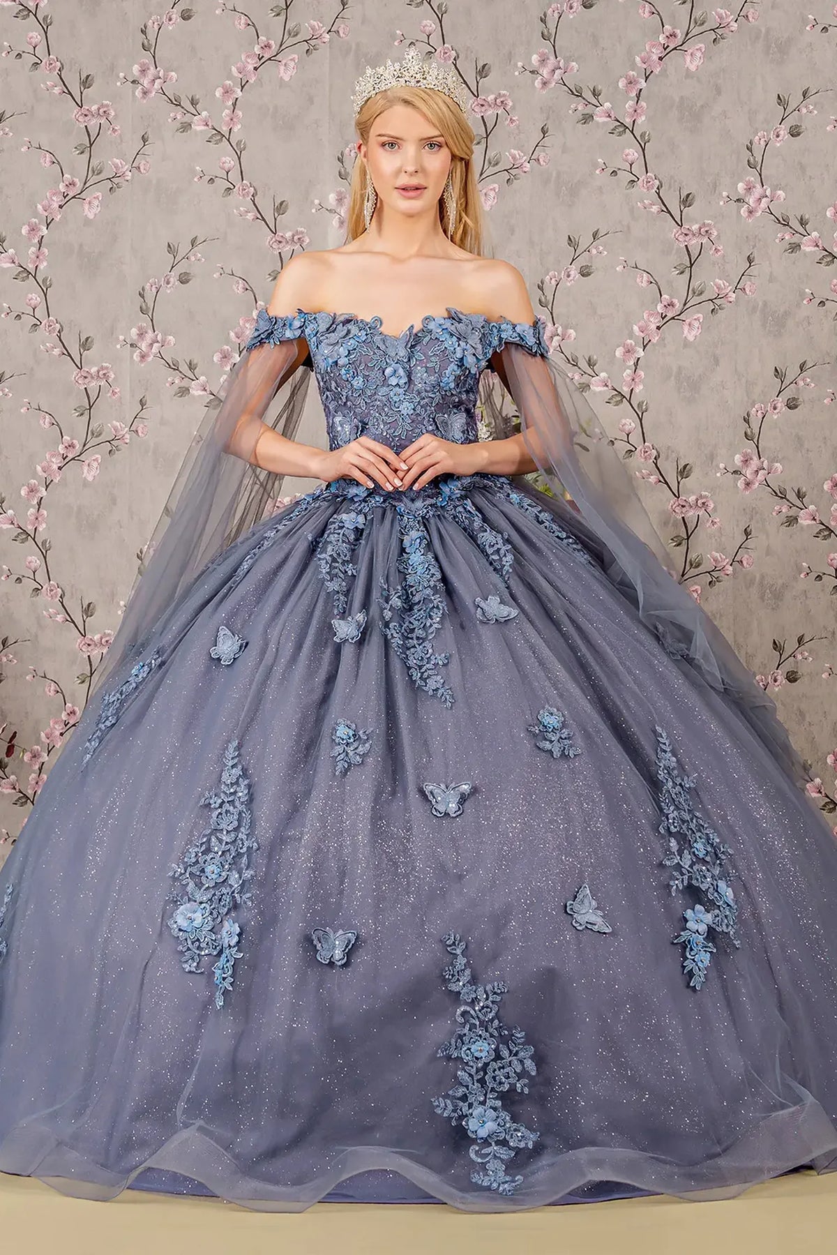 Bodice close-up highlights the Smoky Blue quinceañera ball gown with jeweled glitter mesh.
